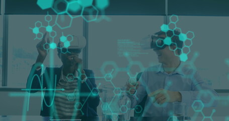 Image of medical data processing on interface, over man and woman wearing vr headsets