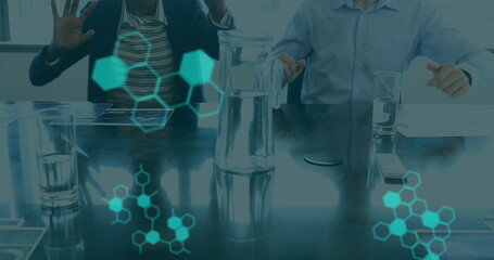 Image of medical data processing on interface, over man and woman wearing vr headsets