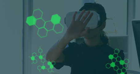 Image of medical data processing over businesswoman wearing vr headset