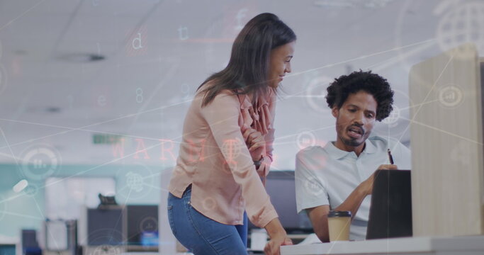 Image of financial data and graphs over diverse female and male coworkers in office