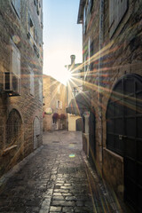 Romantic narrow stone alley in the center of the old town of Budva, Montenegro - 757869440