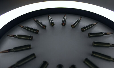 Capsules Of Live Ammunition Lying In A Clock Face Shape In Ring Of Light