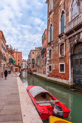 Typical canal in Venice, in the Veneto region of Italy - 757873604