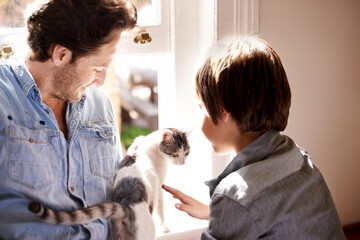 Pet, cat or father with child in home, house or apartment together for support, care or love by...