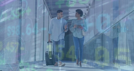 Image of trading board over multiracial coworkers discussing while walking at airport