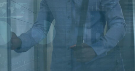 Image of financial data processing over african american businessman