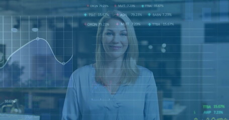 Image of financial data processing over caucasian businesswoman in office