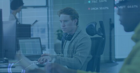 Image of financial data processing over caucasian businessman in office