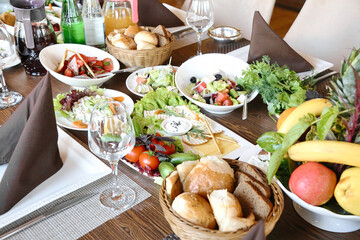 Wooden Table With Assorted Bowls of Food