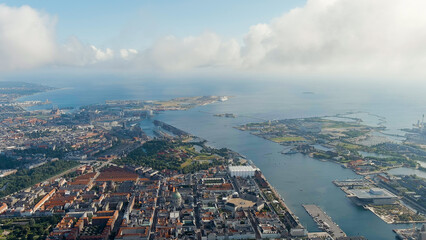 Copenhagen, Denmark. Panorama of the historical part of Copenhagen, Port and Oresund Strait. Beautiful clouds, Aerial View - obrazy, fototapety, plakaty
