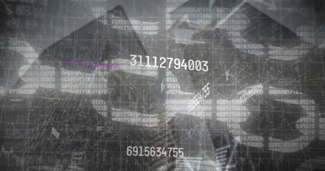 Image of financial data processing over cityscape