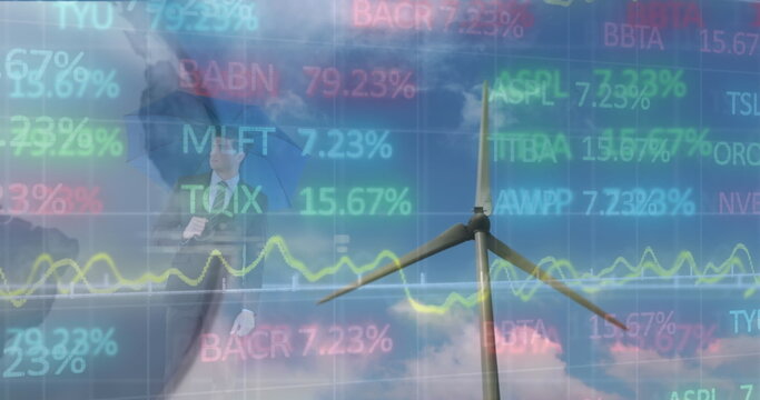 Image of stock market data processing over spinning windmill, globe and caucasian businessman