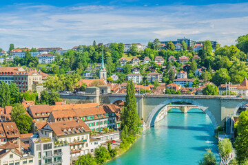 Fototapeta na wymiar Aare river, Nydeggbrucke bridge, cityscape of Bern, Switzerland 