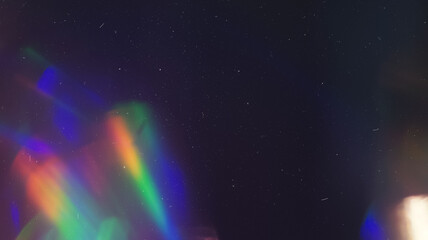 Obraz premium Vibrant Colored Dusted Holographic Rainbow Flares: Perfect for Creative Design and Art Projects. Spectacular Spectrum of Light.