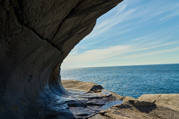 rocky coastline of the atlantic ocean in Brufjellhalene, Norway, a popular travel destination for...