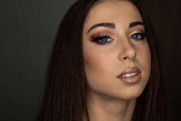 a photo of a young woman with make-up