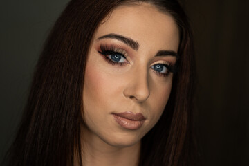 a photo of a young woman with make-up