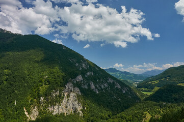 Montenegro. Mountains and forests on the slopes of the mountains. Beautiful valley of Tara riverbed.