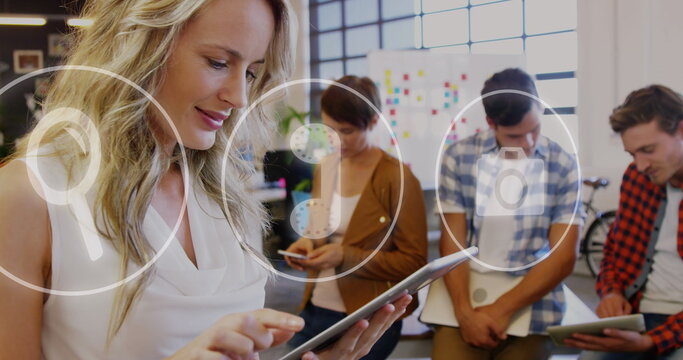 Image of icons and data processing over diverse business people in office