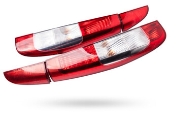 A pair of headlights of a stop signal for a German auto - optical equipment of white and red color...