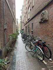 Alley in the red light district filled with bicycles