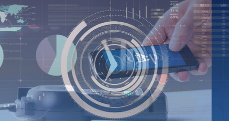 Image of data processing over hand paying with smartphone