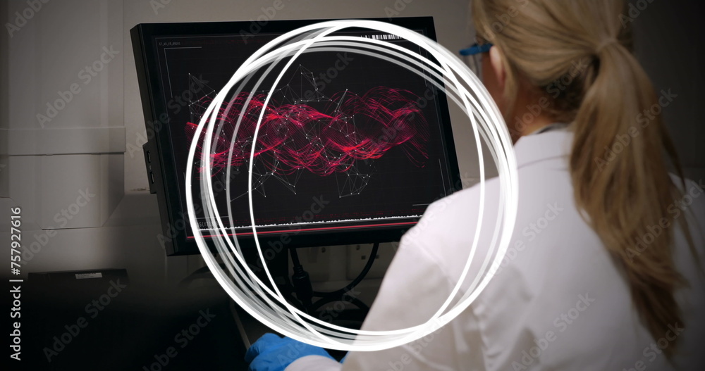 Poster image of circles spinning over female scientist using computer