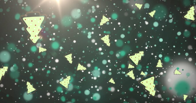 Multiple christmas tree icons against green spots of light on black background