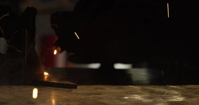 Arc welding smoke and sparks fly