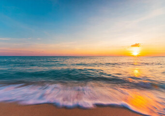 Beautiful tropical beach and sea with coconut palm tree at sunset time for travel and vacation
