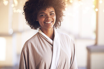 Spa, woman and portrait with smile in a bathrobe for wellness, cosmetics and beauty treatment....