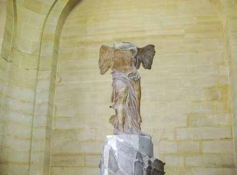 Sculpture of Nike - winged victory of Samothrace in Louvre museum, Paris, France