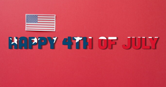 Naklejki Image of 4th of july text over flag of united states of america on red background