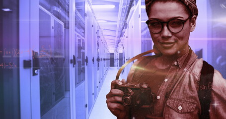 Digital composite of woman with camera in server room, symbolizing global network.