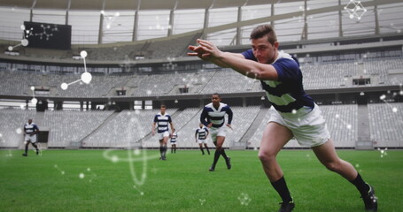 Image of chemical structures over male rugby players at stadium