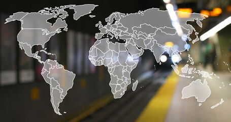 Image of world map over underground train arriving at metro station