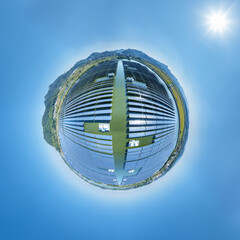 little planet image of solar panels on water