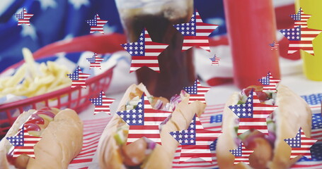 Image of stars with usa flags over hot dogs - obrazy, fototapety, plakaty