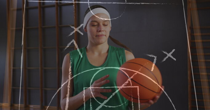Image of drawing of game plan over caucasian female basketball player