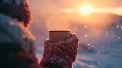 Gordijnen Hot coffee cup in snow winter in rugged lands. © Joyce