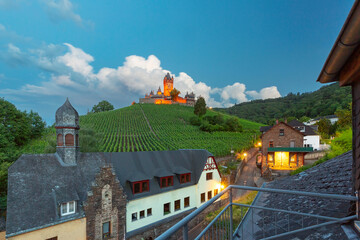 Cochem at sunset, beautiful town on romantic Moselle river, Reichsburg castle on hill, Germany - 757969250