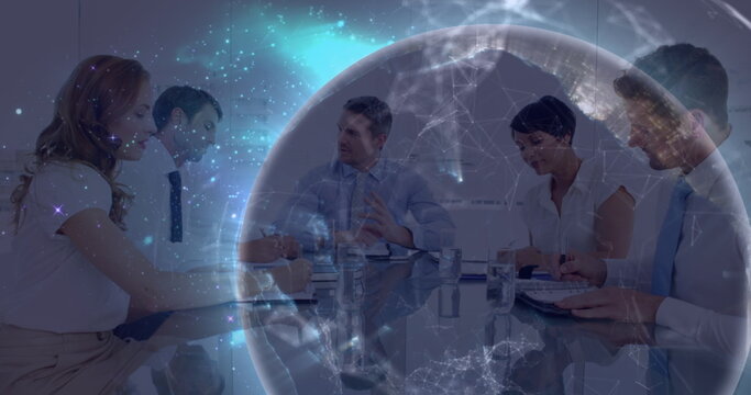 Image of data processing and globe over diverse business people in office