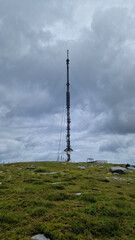 Atop the majestic peak of Kippure, a towering television and radio transmitter mast stands...