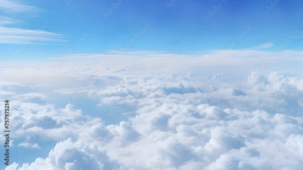 Wall mural a view of the clouds from an airplane window on a sunny day