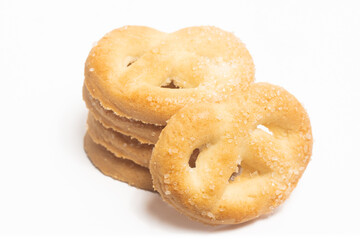 Stacked of danish butter cookies the pretzel cookie isolated on white background clipping path