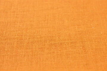 orange hemp viscose natural fabric cloth color, sackcloth rough texture of textile fashion abstract...