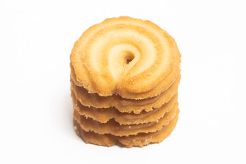 Stacked of danish butter cookies the vanilla ring cookie isolated on white background clipping path