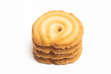 Stacked of danish butter cookies the vanilla ring cookie isolated on white background clipping path