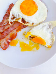 beautiful delicious breakfast of fried eggs and fried bacon.