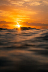 Fototapeta na wymiar Scenic sunrise view from the ocean surface.